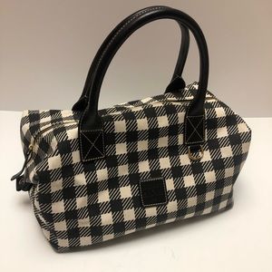 Dooney & Bourke medium houndstooth print purse.